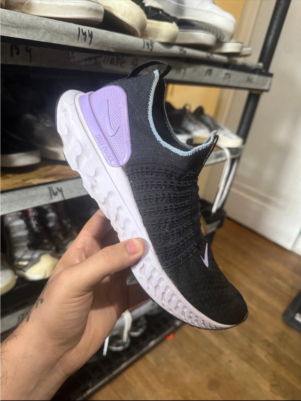 Nike Women's Black Knit Slip-On Running Shoe with Lavender Accents